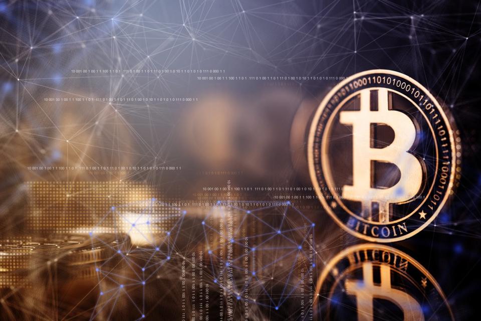 A Bitcoin symbol surrounded by numbers.