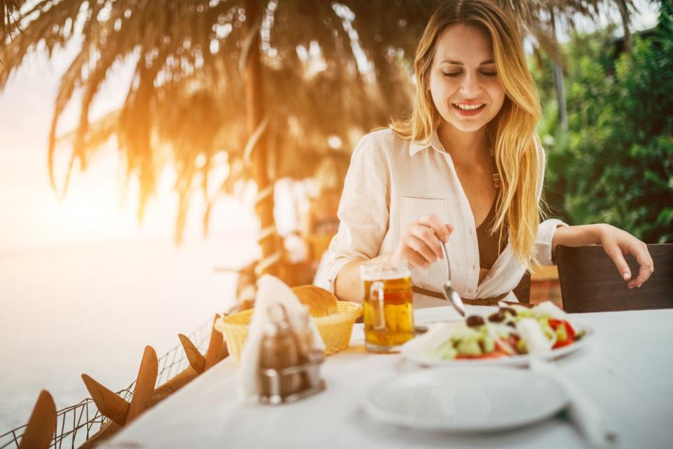 Lady Enjoying Salad by the Beach