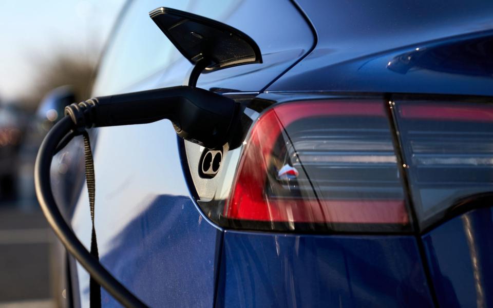 An electric car being recharged